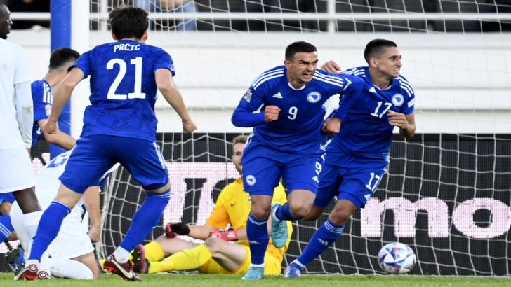Bosnia players celebrate a goal